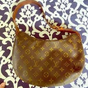 LV Vintage Half Moon Handbag.